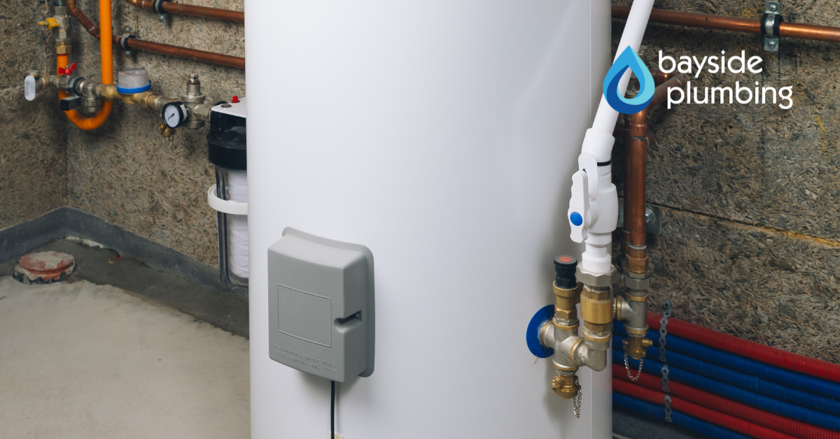 New water heater installed in a home utility area.