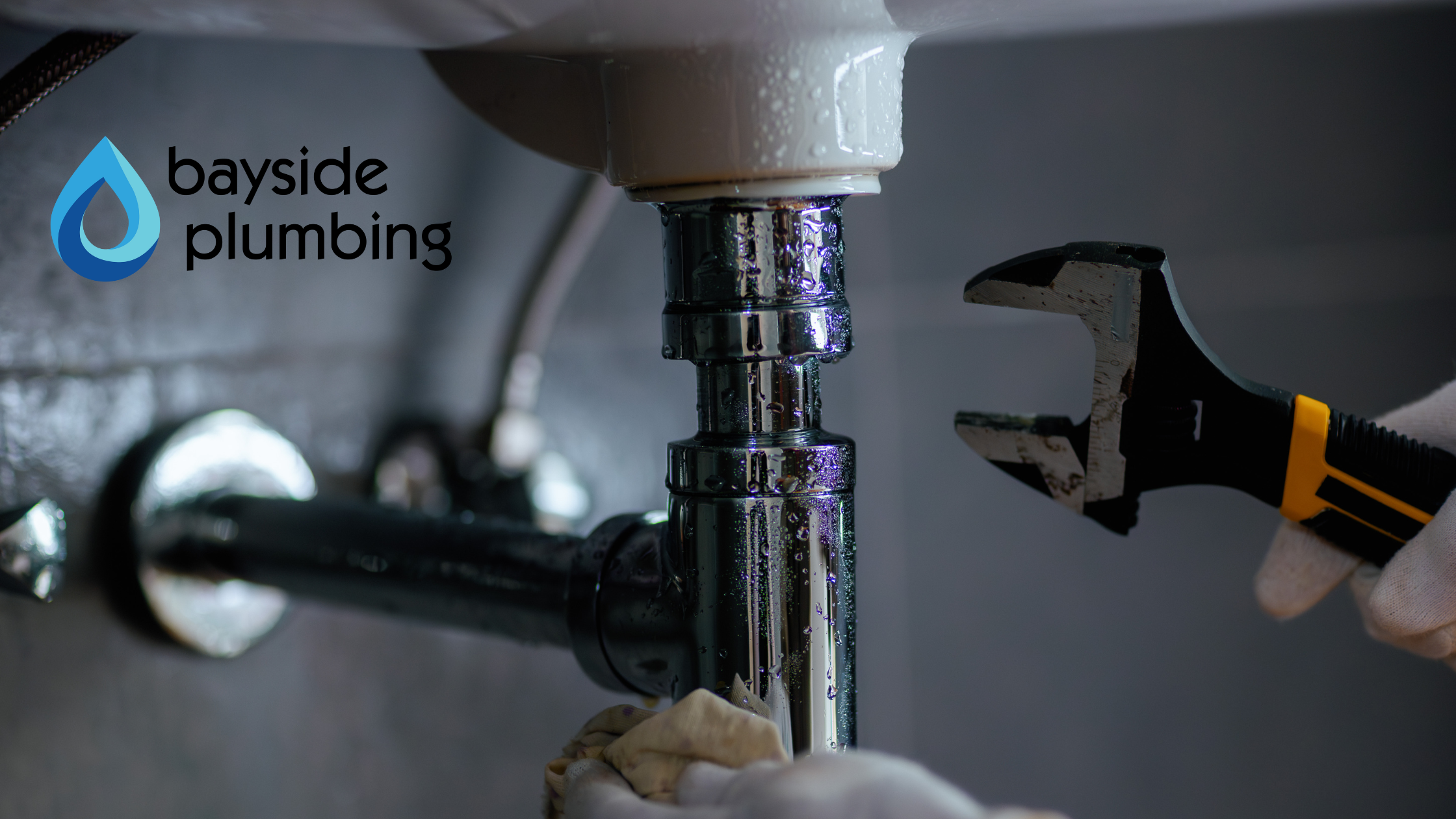 Modern bathroom with updated fixtures, water heater and clean drains